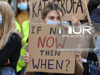 Young protesters with pro-climate banners are seen in Gdansk, Poland, on 25 September 2020  Several hundreds Children and young people weari...