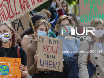 Young protesters with pro-climate banners are seen in Gdansk, Poland, on 25 September 2020  Several hundreds Children and young people weari...