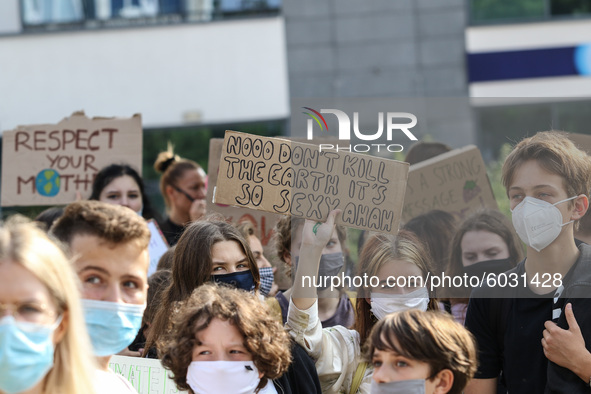 Young protesters with pro-climate banners are seen in Gdansk, Poland, on 25 September 2020  Several hundreds Children and young people weari...