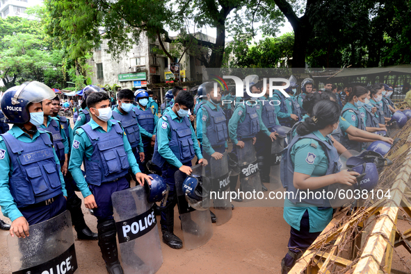 Police standard in front of Ministry of Education during Student Union activists stage a demonstration demanding reducing the fee of school...