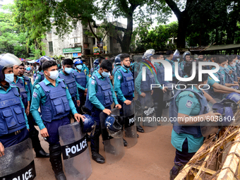 Police standard in front of Ministry of Education during Student Union activists stage a demonstration demanding reducing the fee of school...