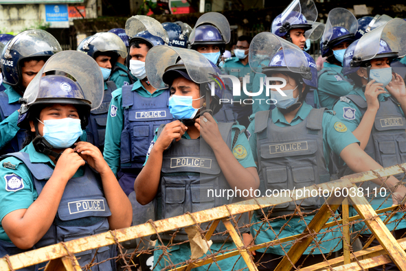 Police standard in front of Ministry of Education during Student Union activists stage a demonstration demanding reducing the fee of school...