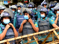 Police standard in front of Ministry of Education during Student Union activists stage a demonstration demanding reducing the fee of school...