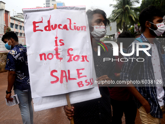 Student Union activists stage a demonstration in front of Ministry of Education demanding reducing the fee of school and college students du...