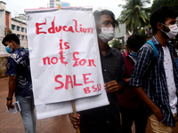 Student Union activists stage a demonstration in front of Ministry of Education demanding reducing the fee of school and college students du...