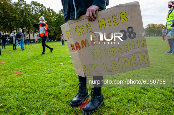 A student is holding a placard, during the students protest for more physical attendance classes, in Amsterdam, Netherlands on October 2nd,...