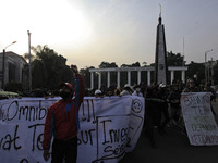 Indonesian student shout a slogan during a demonstration against a new Indonesian labour law passed last week, in Bogor, West Java, October...