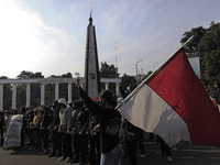 Indonesian student shout a slogan during a demonstration against a new Indonesian labour law passed last week, in Bogor, West Java, October...