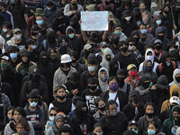 Indonesian student shout a slogan during a demonstration against a new Indonesian labour law passed last week, in Bogor, West Java, October...