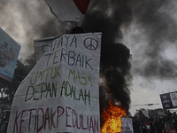 A Indonesian student shout a slogan during a demonstration against a new Indonesian labour law passed last week, in Bogor, West Java, Octobe...