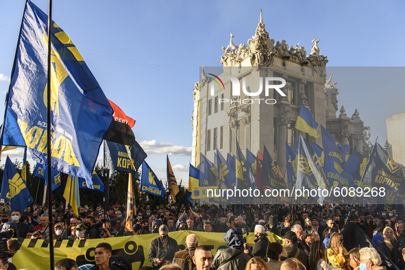 Veterans, activists and supporters of Ukraine's nationalist movements take part in a procession to mark the Defender of Ukraine Day and the...