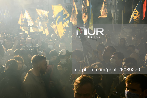 Veterans, activists and supporters of Ukraine's nationalist movements take part in a procession to mark the Defender of Ukraine Day and the...