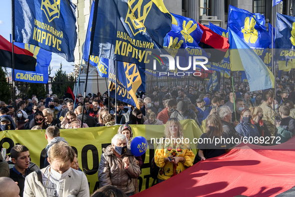 Veterans, activists and supporters of Ukraine's nationalist movements take part in a procession to mark the Defender of Ukraine Day and the...