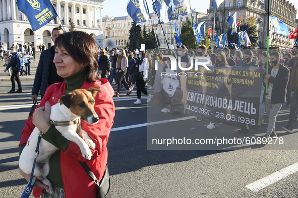 Veterans, activists and supporters of Ukraine's nationalist movements take part in a procession to mark the Defender of Ukraine Day and the...