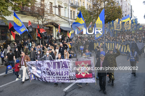 Veterans, activists and supporters of Ukraine's nationalist movements take part in a procession to mark the Defender of Ukraine Day and the...