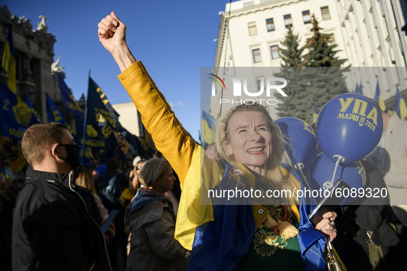 Veterans, activists and supporters of Ukraine's nationalist movements take part in a procession to mark the Defender of Ukraine Day and the...