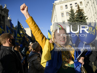 Veterans, activists and supporters of Ukraine's nationalist movements take part in a procession to mark the Defender of Ukraine Day and the...