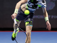Andrey Rublev of Russia serves the ball during his ATP St. Petersburg Open 2020 international tennis tournament match against Ugo Humbert of...