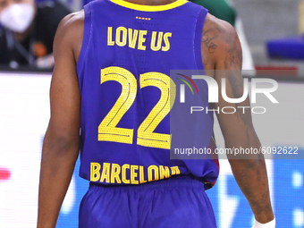 Cory Higgins with the word love us on the back of his shirt during the match between FC Barcelona and Panathinaikos BC, corresponding to the...