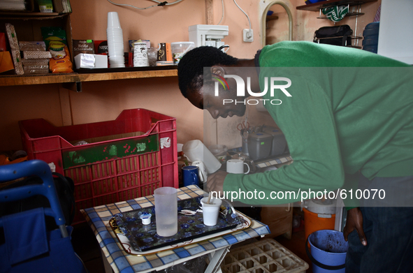 Anton Gordon is preparing English coffee in the small shop his family owns in the village of Kostur, Bulgaria on May 02, 2015 