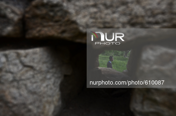 Rhys Gordon is having a walk through his house's yardon in the village of Kostur, Bulgaria on May 12, 2015 