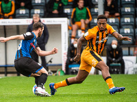 Jimmy Ryan of Rochdale AFC wrong foots Mallik Wilks of Hull City FC during the Sky Bet League 1 match between Rochdale and Hull City at Spot...