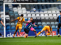 Mallik Wilks of Hull City FC heads in the opening goal for Hull City during the Sky Bet League 1 match between Rochdale and Hull City at Spo...