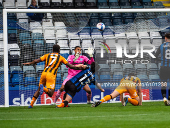 Mallik Wilks of Hull City FC heads in the opening goal for Hull City during the Sky Bet League 1 match between Rochdale and Hull City at Spo...