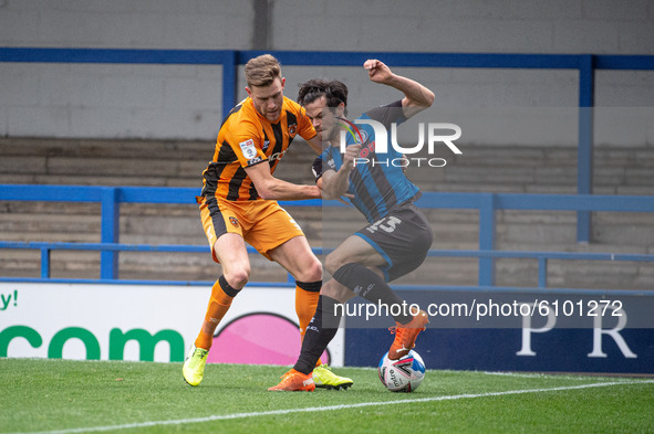 Jimmy Keohane of Rochdale AFC tangles with Callum Elder of Hull City FC during the Sky Bet League 1 match between Rochdale and Hull City at...