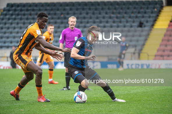 Ollie Rathbone of Rochdale AFC under pressure from Josh Emmanuel of Hull City FC during the Sky Bet League 1 match between Rochdale and Hull...