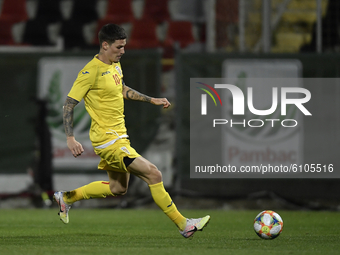 Dennis Man of Romania in action during the soccer match between Romania U21 and Malta U21 of the Qualifying Round for the European Under-21...