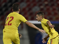 Alexandru Matan of Romania U21 scores and celebrates during  the soccer match between Romania U21 and Malta U21 of the Qualifying Round for...