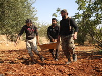 Members of the Syrian armed opposition (Jaysh al-Izza) target sites of the Syrian regime in the southern countryside of Idlib in the northwe...