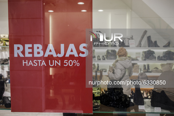 Sale posters are seen in stores at the beginning of the winter sales season in Palma de Mallorca while the autonomic Mallorca government wil...