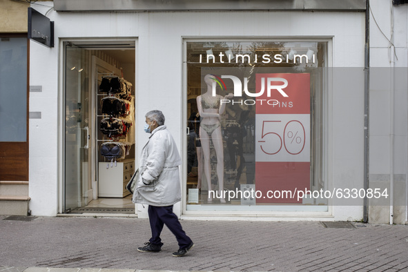 Sale posters are seen in stores at the beginning of the winter sales season in Palma de Mallorca while the autonomic Mallorca government wil...