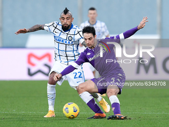 Giacomo Bonaventura of ACF Fiorentina and Arturo Vidal of FC Internazionale compete for the ball during the Coppa Italia match between ACF F...