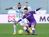 Giacomo Bonaventura of ACF Fiorentina and Arturo Vidal of FC Internazionale compete for the ball during the Coppa Italia match between ACF F...