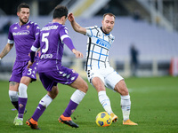 Christian Eriksen of FC Internazionale and Giacomo Bonaventura of ACF Fiorentina compete for the ball during the Coppa Italia match between...