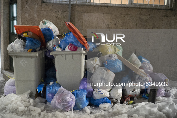 Accumulated garbage is seen in the streets of Madrid due to the snow caused by storm Filomena on January 14, 2021 in Madrid, Spain. 