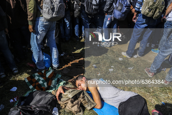 Migrants are waiting to enter to the transfer camp in Opatovac near border crossing point between Serbia and Croatia. Opatovac, Croatia. Sep...