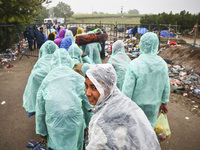 Refugees arrive at the Serbia-Croatia border, between Berkasovo and Bapska on September 26, 2015. A record number of refugees from the Middl...