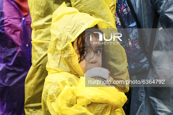 Refugees arrive at the Serbia-Croatia border, between Berkasovo and Bapska on September 26, 2015. A record number of refugees from the Middl...