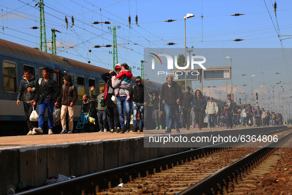 Migrants arrive by train to Hegyeshalom train station close to the Hungarian-Austrian border. Hegyeshalom, Hungary on 28 September 2015. A r...