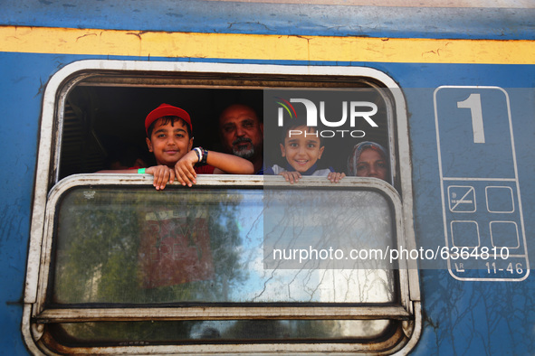 Migrants arrive by train to Hegyeshalom train station close to the Hungarian-Austrian border. Hegyeshalom, Hungary on 28 September 2015. A r...