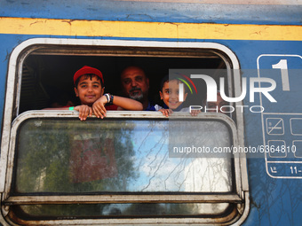 Migrants arrive by train to Hegyeshalom train station close to the Hungarian-Austrian border. Hegyeshalom, Hungary on 28 September 2015. A r...