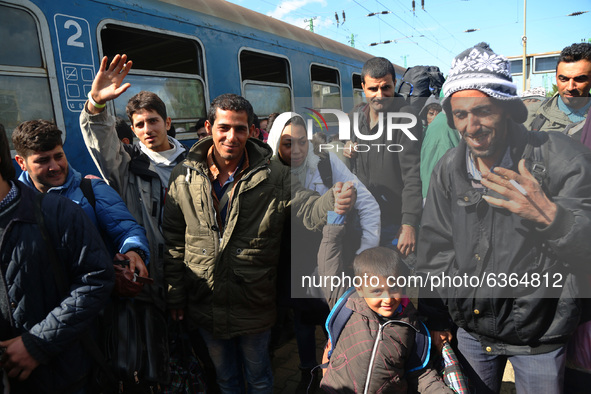 Migrants arrive by train to Hegyeshalom train station close to the Hungarian-Austrian border. Hegyeshalom, Hungary on 28 September 2015. A r...