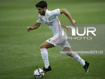 Marco Asensio of Real Madrid runs with the ball during the Supercopa de Espana Semi Final match between Real Madrid and Athletic Club at Est...