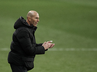 Zinedine Zidane of Real Madrid gives instructions during the Supercopa de Espana Semi Final match between Real Madrid and Athletic Club at E...
