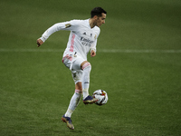 Lucas Vazquez of Real Madrid controls the ball during the Supercopa de Espana Semi Final match between Real Madrid and Athletic Club at Esta...