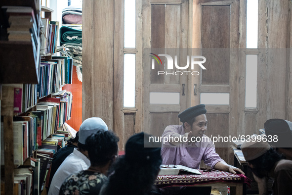 Ustadz HALIM AMBIYA explaining about Islam to the students after pray. Islamic boarding school for punk and street children in Ruko Cimanggi...